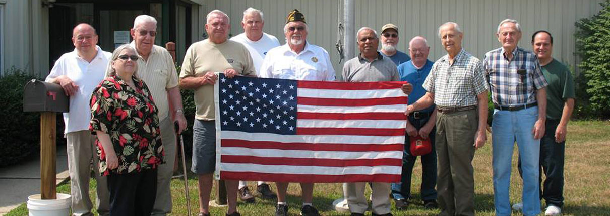Seniors Holding the American Flag